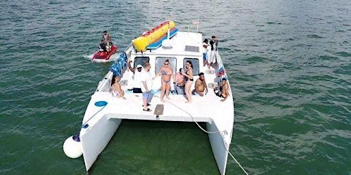 Catamaran watersports party Ultimate Excursion Jet skis, tubing, tour drink