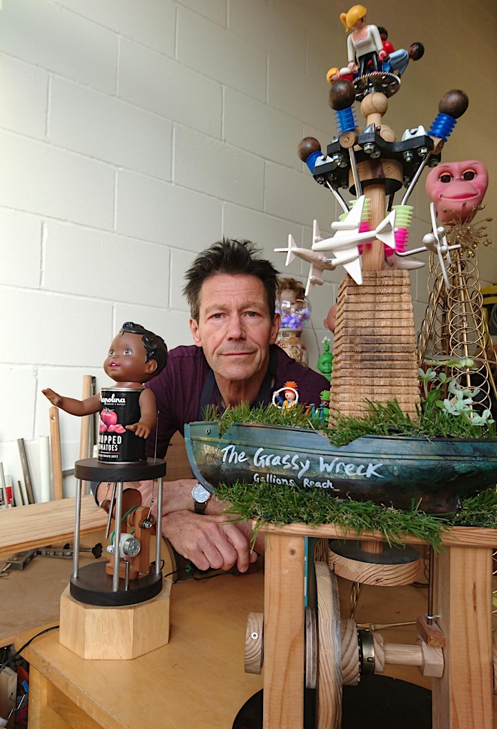 Stephen Guy surrounded by his handmade automata