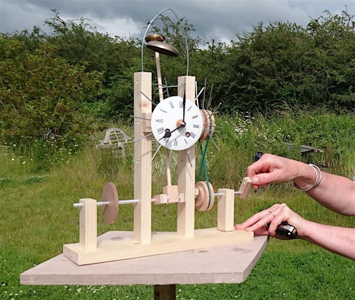 A clock face on a mechanical base