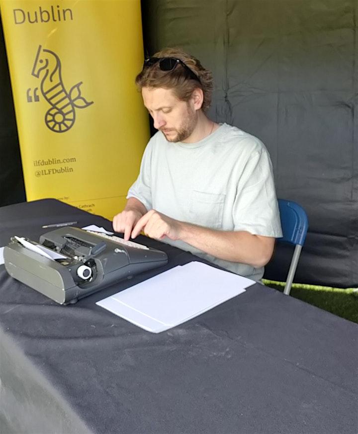 Stephen Maguire, type writer poet, at the Fingal Poetry Festival 2022 image