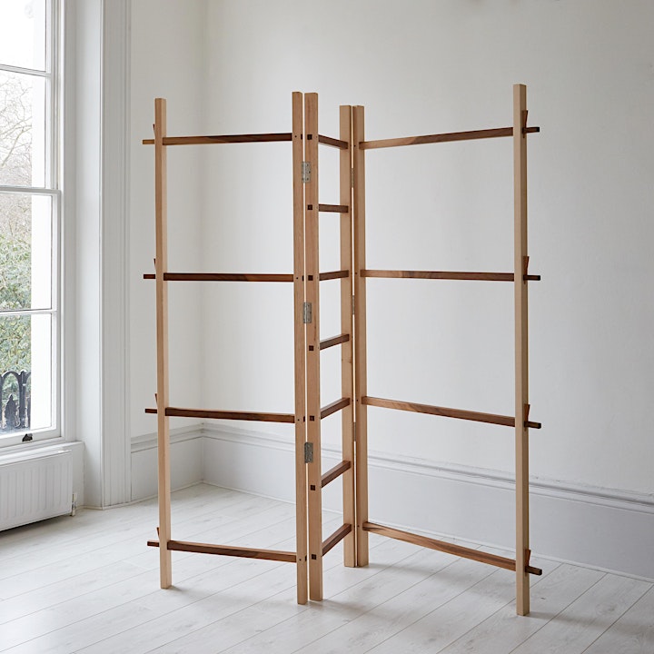 Boundary, folding wooden screen in a white room. made by Beuzeval Furniture. Exhibited with Blue Patch.