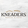 Logotipo de Kneaders Bakery & Cafe