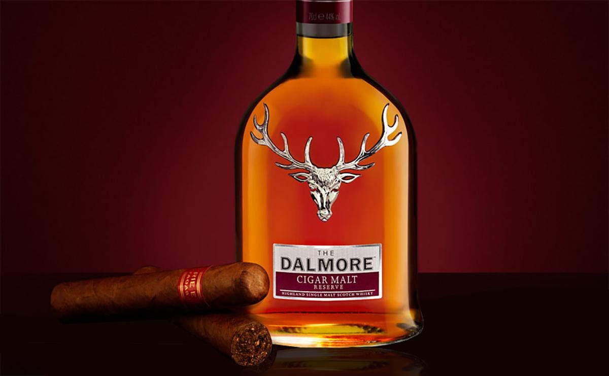 Dalmore Scotch and a Cigar Roller On Our Waterfront Patio
