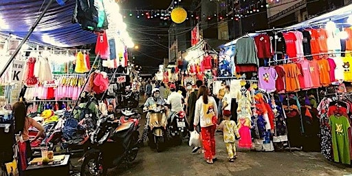 The festival at the night market is extremely lively primary image