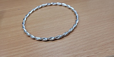 TWISTED SILVER BANGLE primary image