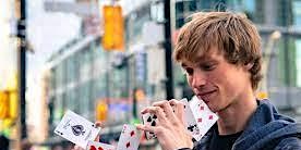 Magician performance night on the street is extremely exciting primary image