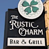 Logótipo de The Rustic Charm Bar & Grill