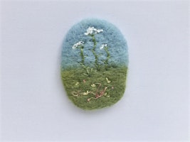 Needle felted brooch with embroidered flowers