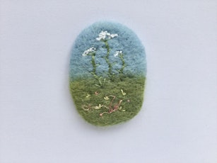 Needle felted brooch with embroidered flowers