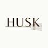 Logotipo de Husk Brooms