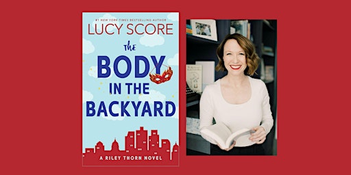Immagine principale di Lucy Score signs The Body in the Backyard. 