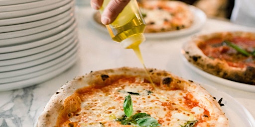 margherita pizza with drizzling olive oil before serving 