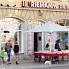 Buchhandlung RIEMANN's Logo